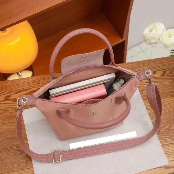 sg-11134201-8258u-mq6qpjl1iz9qff.webp Short Handle Sling Bag